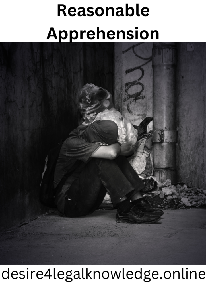 A person sitting beside a wall threatened.